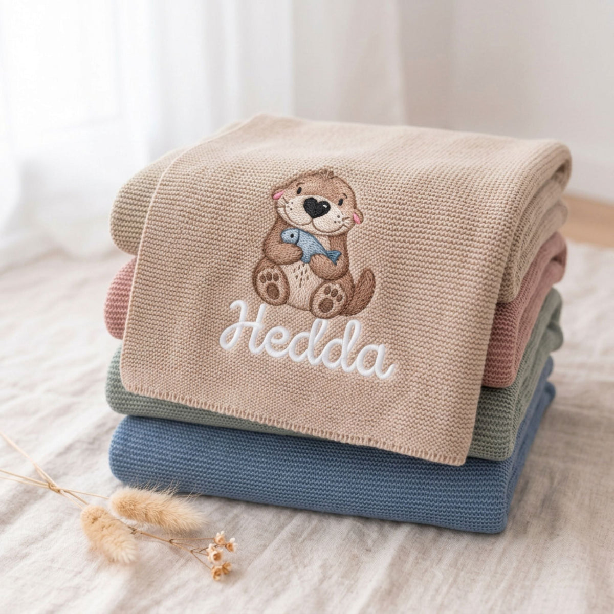 Babydecke personalisiert aus 100 % Bio-Baumwolle - Otter mit Fisch - wunderwunsch