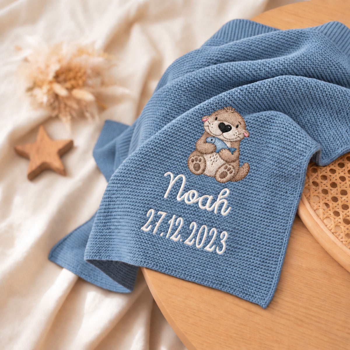 Babydecke personalisiert aus 100 % Bio-Baumwolle - Otter mit Fisch - wunderwunsch